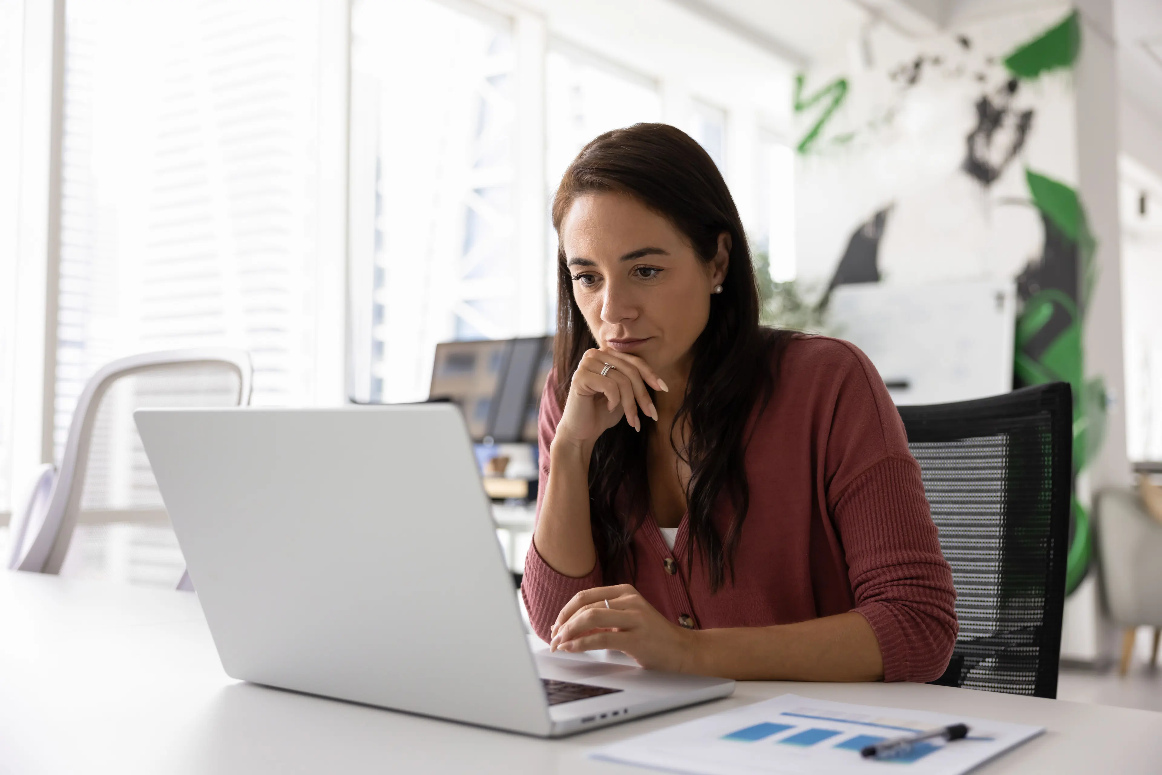 Adobe Stock of woman reading an email on her laptop